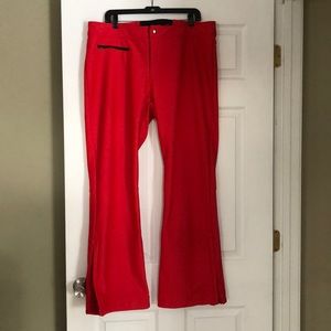 Women’s extra stretchy snow pants. Coral color.